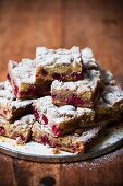 Cherry cake with crumble topping and icing sugar