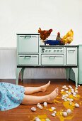 Caucasian woman on kitchen floor with broken eggs