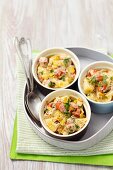Potatoes with leek and sausages in horseradish cream