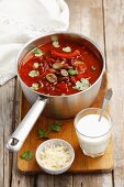 Kidney bean soup with peppers, yoghurt and cheese