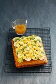 Coconut sponge cake with tropical fruits