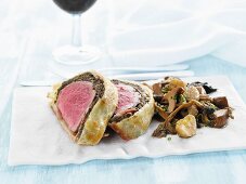 Beef Wellington (beef fillet in puff pastry) with mushrooms