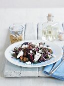 Beetroot salad with lentils, pecan nuts and goat's cheese