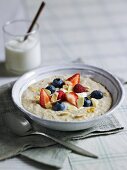 Porridge with fresh berries and flaked almonds
