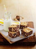 Chocolate slices with hazelnuts, raisins and biscuits