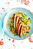 Fried duck breast with oriental fried noodles