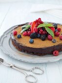 A truffle cake with summer berries