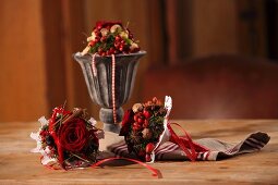 Hand-made Christmas posies of roses and spices