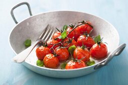 Roasted cherry tomatoes with basil