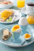 Soft-boiled eggs in egg cups