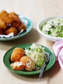 Salami and cheese croquettes with coleslaw