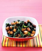 Fried sweet potatoes with spinach
