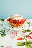 A strawberry tartlet topped with meringue