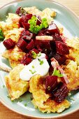 Shredded potato pancake with beetroot and sour cream