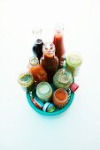 Various types of ready-made sauces in a plastic basket