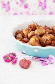 Flower bulbs in ceramic dish