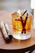 A cinnamon cocktail over ice