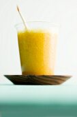 A mango and banana smoothie with curry