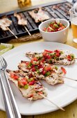 Marinated chicken skewers with salsa (Brazil)