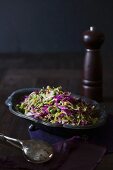 A red cabbage salad with Brussels sprouts and peas