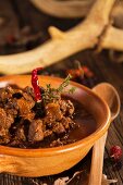 Venison goulash with chilli peppers