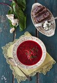 Vegitarian borscht with bread and a cheese spread