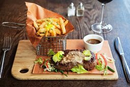 Steak with Peppercorns and French Fries