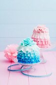 Pink and light blue mini cakes