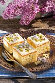 Amaretto slices garnished with lilac flowers