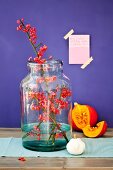 Branches of spindle arranged in large storage jar