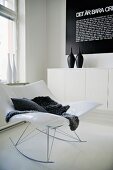 White Stingray rocking chair in corner of modern living room