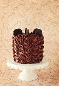 A chocolate cake with Oreo cookies