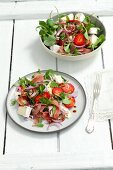 Rocket salad with strawberries, Camembert, Proscuitto and red onions