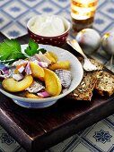 Herring salad with apple and onion for Christmas