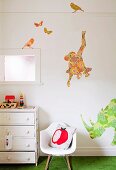 Wall decals of exotic animals in child's bedroom