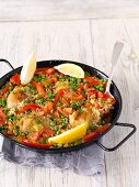 Paella with chicken and red peppers