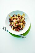 Spicy fried pasta with chorizo, radicchio and seeds