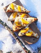 Ricotta pizza with oranges and chopped pistachio nuts