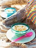 Yoghurt with pineapple and peanuts for a Caribbean picnic on a beach