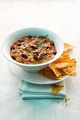 Rice stew with chilli beans and tortilla crisps