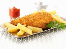 Breaded chicken leg with chips
