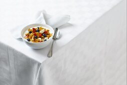 Yogurt with cornflakes and fruit