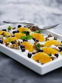 Skyr yoghurt with mandarins, blueberries and walnuts