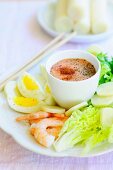 Heart of palm salad with prawns and egg