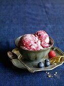 Berry-sour cream ice cream with blueberries and raspberries