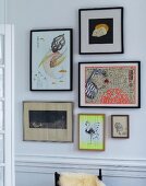 Framed drawings on wall