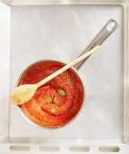 Tomato sauce in a pan (seen from above)