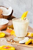A mango and coconut smoothie with yoghurt