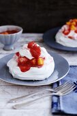 Pavlova with fruit compote