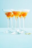 Champagne with spiced kumquats